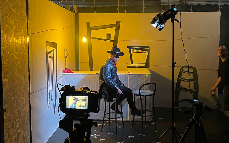 Ronnie Kommene at the desk of Camere d'aria in Bologna